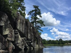 Grundy Lake Gut Lake Trail south end view bedrock cliffs Olivia 300x225